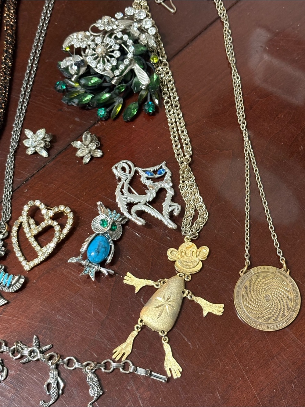 Lot of this and that costume jewelry— odd and curious pieces